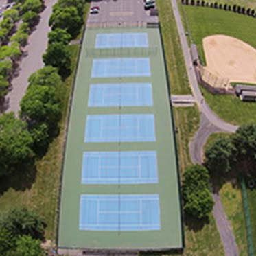 Aerial View Of Several Tennis Courts