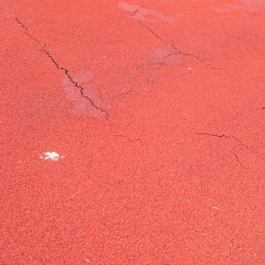 Cracks In Red Running Track Surface