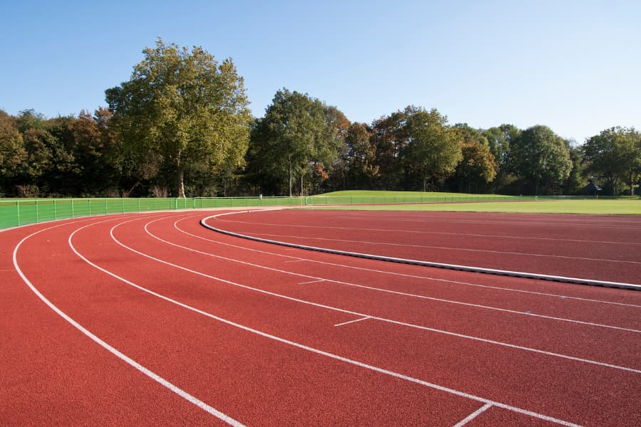 Running Track With Trees In The Background